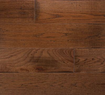 6 inch wide plank hickory saddle hardwood in a kitchen dark wood stain